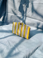 Lime green striped battua