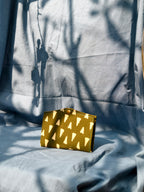 Green triangle battua