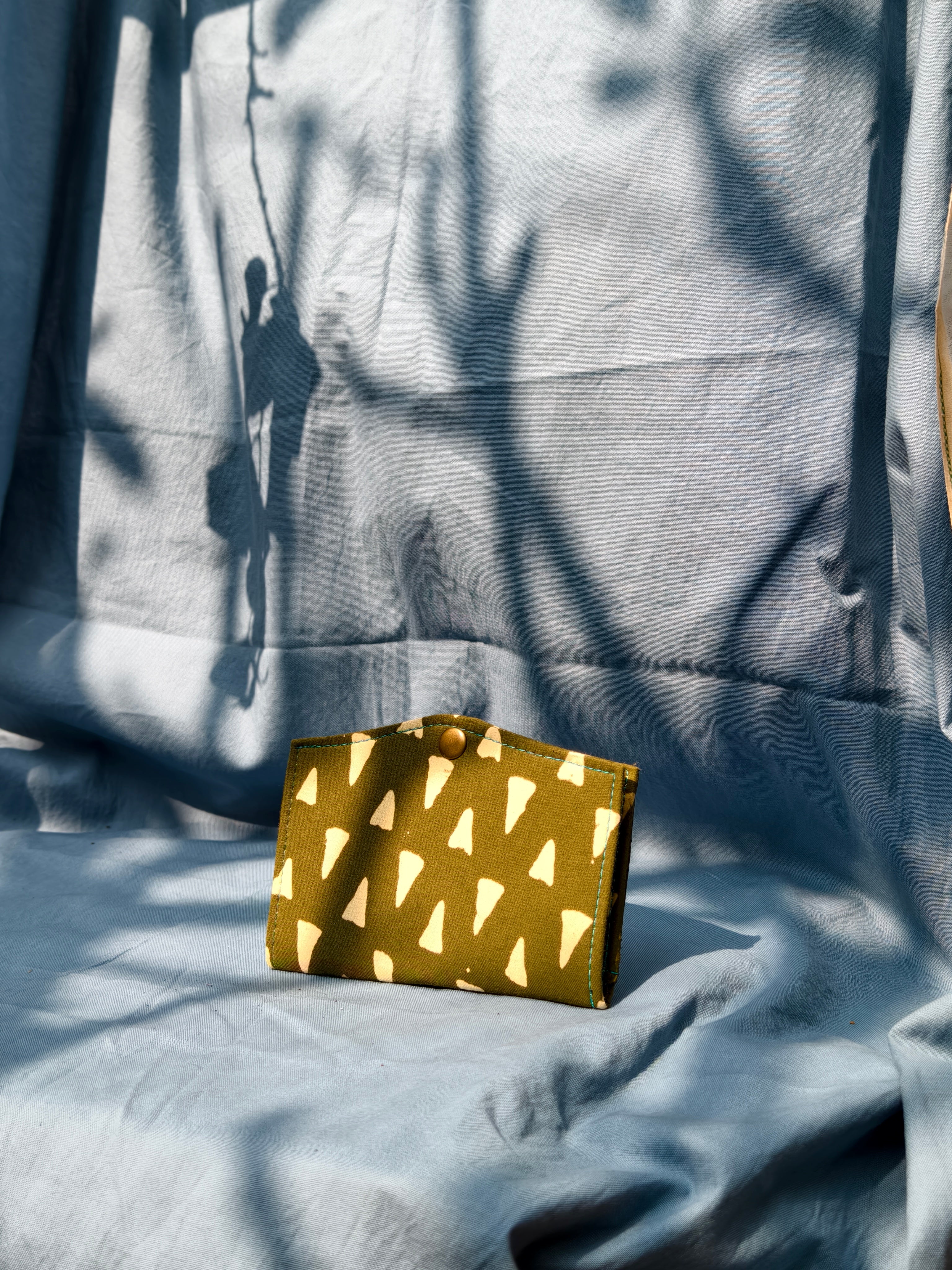 Green triangle battua