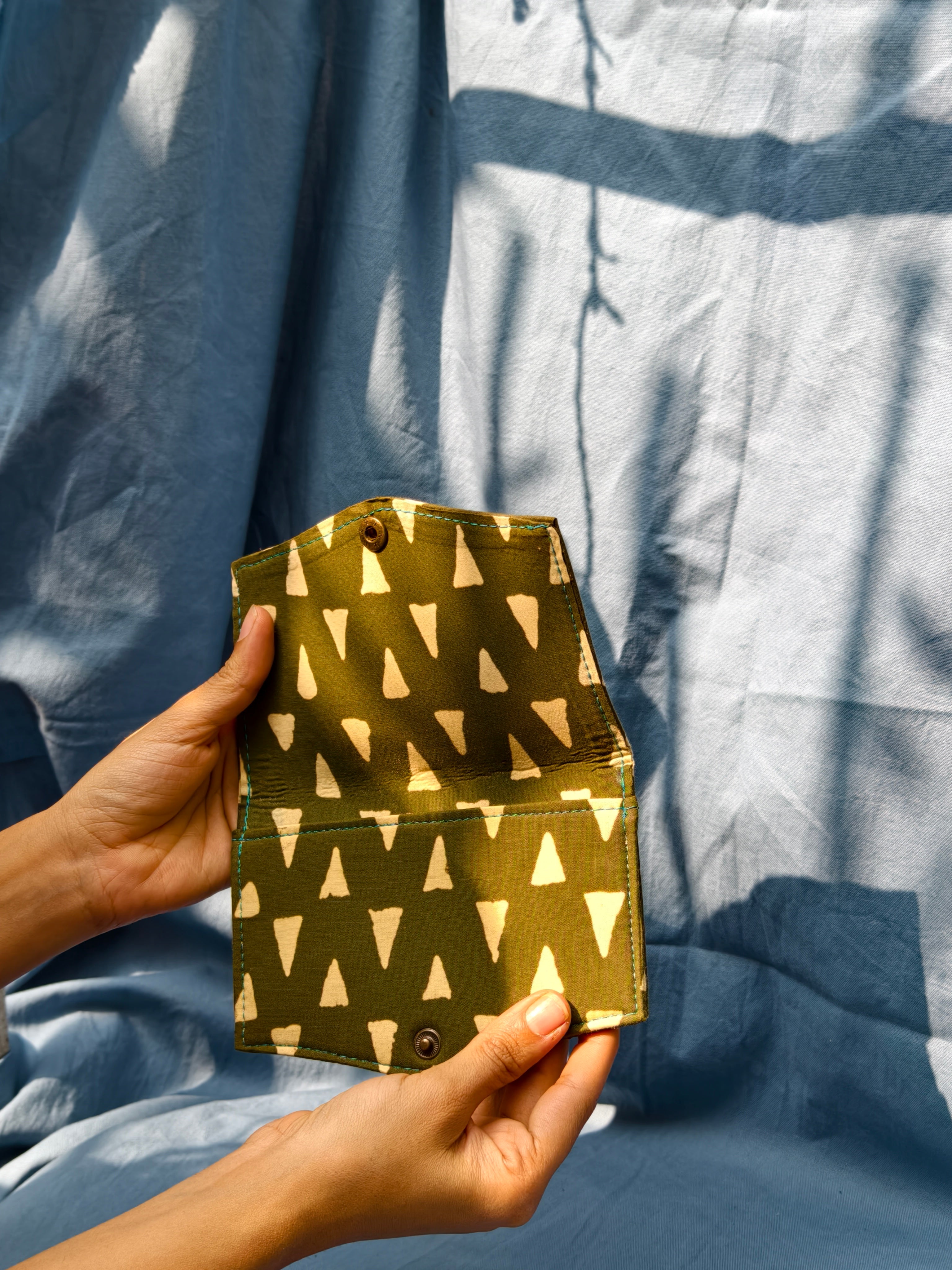 Green triangle battua